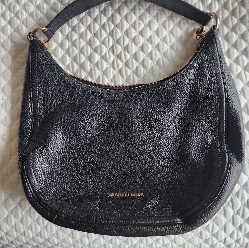 Michael Kors back leather purse.
